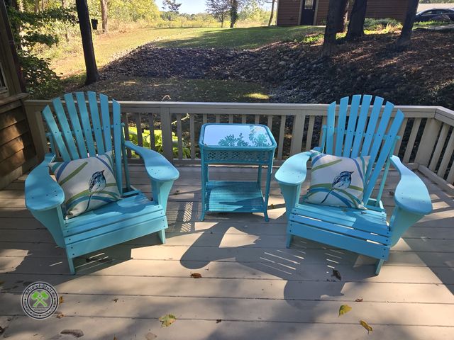 Lot 53-663 - Like New Adirondack Chairs and Wicker Table