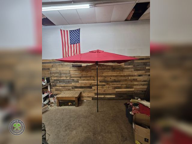 Lot 53-829 - Red Outdoor Patio Table Umbrella - 5ft x 76" x 86" Tall - Has a couple small holes that could be pat...