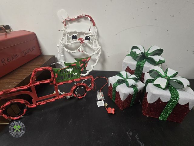 Lot 53-654 - Lighted Santa and Lighted Red Truck Displays and Nesting Lighted Presents (BSMT)