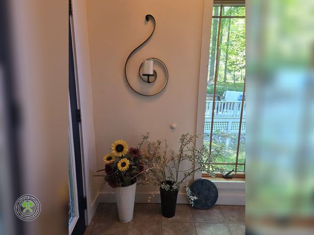 Lot 53-657 - Metal Candle Wall Decor, 2 Metal Tin Vases with Floral Arrangements and Blue Ceramic Wall Decor