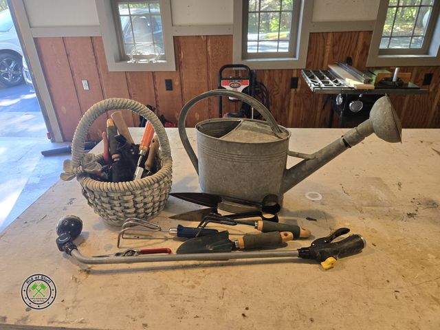Lot 53-677 - Basket filled with outdoor yard items, Hand rakes, sprinkler, Hand gardening tools, Galvanized Water...