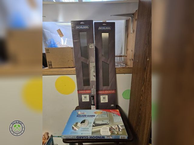 Lot 53-738 - (2) 8"x34" Stainless Kick Plates, NOS Easy Mount Garage Door Opener, 2 packages of window guard (BSM...