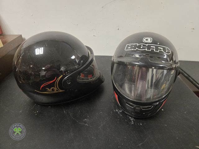 Lot 53-670 - Motorcycle Full Face Helmets - One is a size small, other does not have a size. Both in great condit...