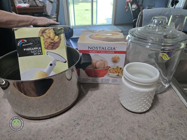 Lot 53-532 - Stockpot with Lid, Glass Storage Jar with Lid, Egg Cooker, Pineapple Slicer and more