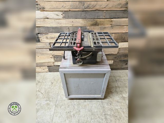 Lot 53-965 - Electric Craftsman Table Saw Mounted on a box platform with casters for easy rolling! Plugged in and...