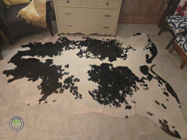 Lot 53-597 - Authentic Real Cow Hide Area Rug - From Brazil - Very Clean - Measures approximately: 91"x71"