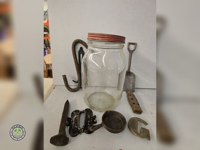Lot 53-564 - Old Glass Jar filled with Old railroad spike, shovel, mini cast iron pan, drawer pulls and more (B)