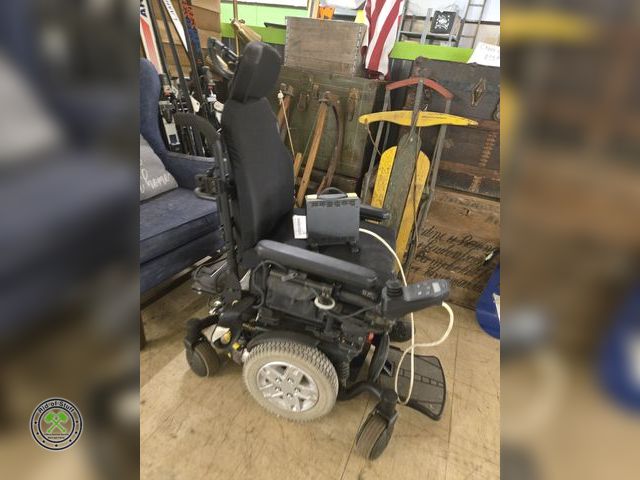 Lot 53-500 - Quantum Medical Electric Wheelchair. Comes with charger, may need new batteries.