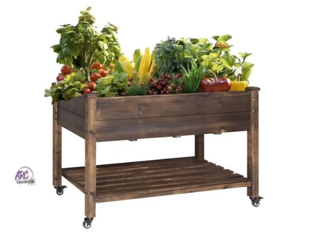 Lot 56-679857 - New in box. 48 in. x 24 in. x 33 in. Wood Carbonized Raised Garden Bed with Lockable Wheels and Line...