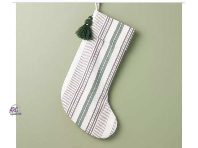 Lot 56-321030 - New, Hearth &amp; Hand with Magnolia Textured Mixed Stripe Christmas Stocking