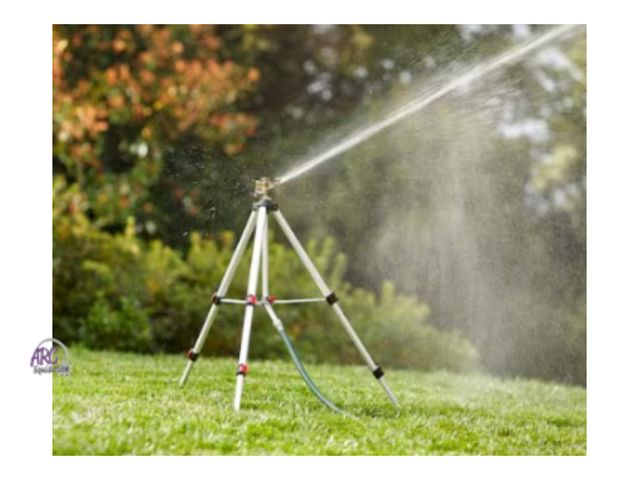 Lot 56-452660 - New - Metal Pulsating Sprinkler with Tripod - Provides coverage of up to 7,850 sq. ft. - Features 36...