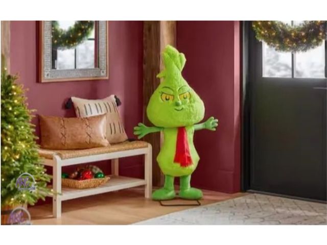 Lot 56-731630 - New 4ft life size animated character lil Grinch. Plays music