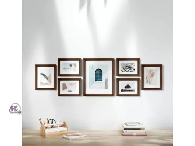 Lot 56-797514 - New in box. Umbra 7-piece Gallery Picture Frame Set. Aged walnut