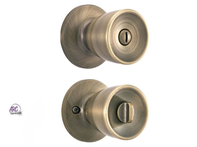 Lot 56-368998 - New,Brinks Interior Locking Privacy Classic Bell Style Doorknob, Antique Brass Finish