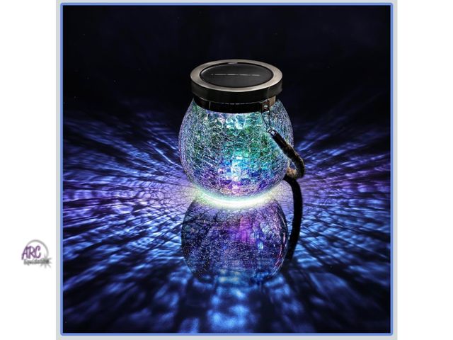 Lot 56-122225 - New Cooo Solar Lantern Outdoor Waterproof Iridescent Crackle Glass with Stainless Steel Lid – Rainbo...