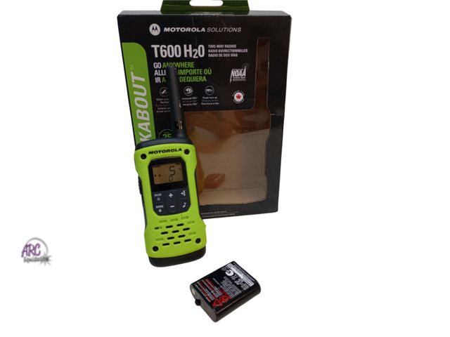 Lot 56-795314 - New Motorola T600 H2O two way radio w/ extra battery.