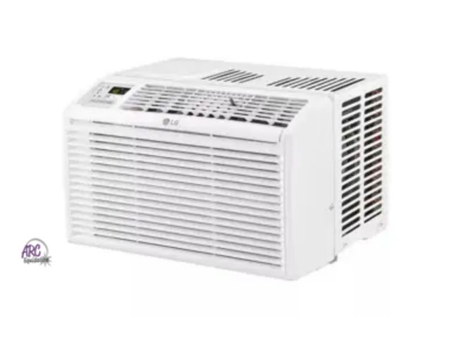 Lot 56-466412 - USED-TESTED--SLIGHT BOX DAMAGE-LG MODEL LW6017R 6,000 BTU air conditioner-white- fits windows 21"-35...