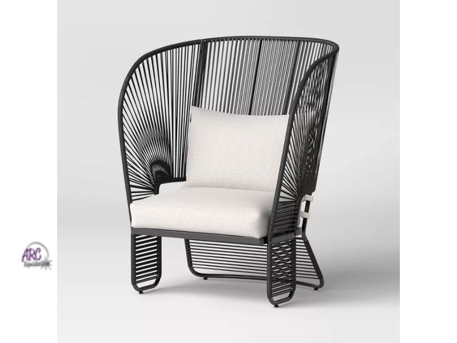 Lot 56-780612 - New in box. Mackworth Patio Statement Armless Chair Black