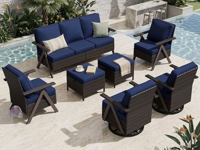 Lot 56-753460 - New open box. Retail $1112. 7-Piece Brown Rattan Outdoor Wicker Patio Conversation Set with Blue Cus...