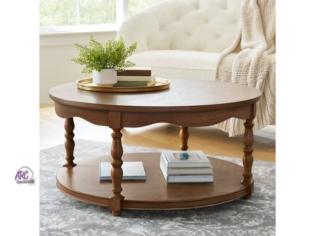 Lot 56-784412 - New in box.Pioneer Woman Helen Round Coffee Table, Heirloom Brown