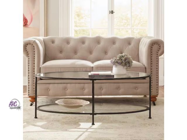 Lot 56-662140 - New opened box - Bella Large Oval Antique Bronze Metal and Glass Coffee Table with Shelf (46 in. W x...