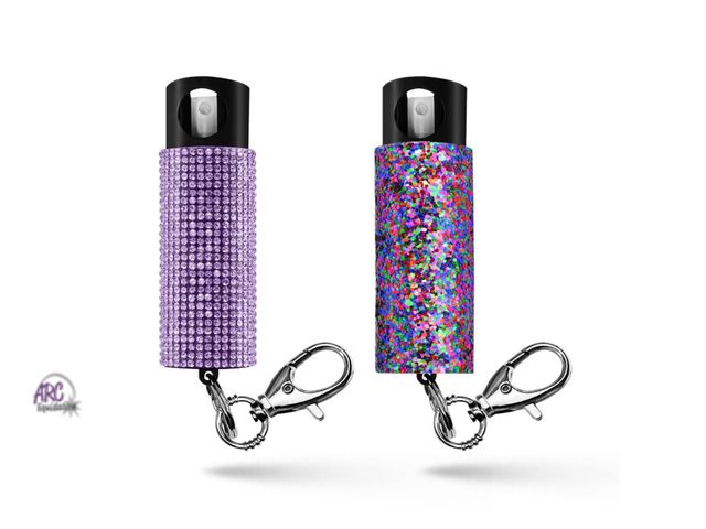 Lot 56-824830 - NEW Guard Dog Security Bling It On Pepper Spray 2pk Glow-In-The-Dark 16' Distance Lavender and Ameth...