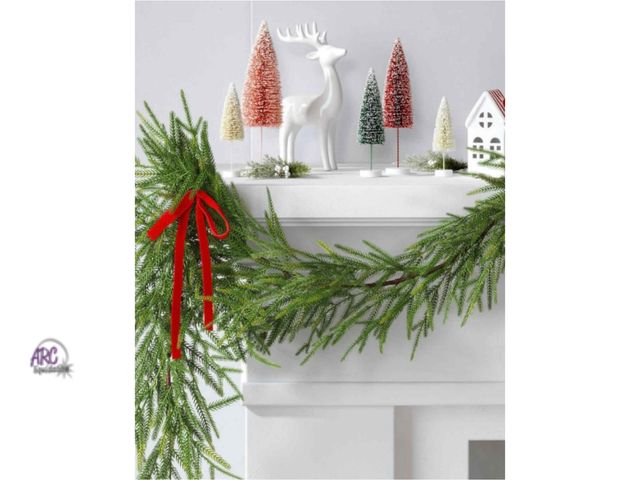 Lot 56-720830 - New Wondershop 6’ Unlit Norfolk Pine Draping Garland Red Bows Not Included