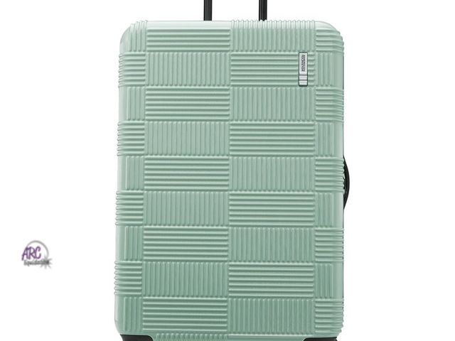 Lot 56-865817 - New American Tourister NXT Checkered Hardside Carry On Spinner Suitcase Retail $109
