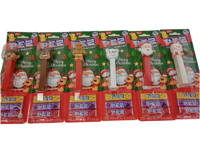 Lot 56-725430 - New lot of 6 Christmas pez. Candy and dispensers.