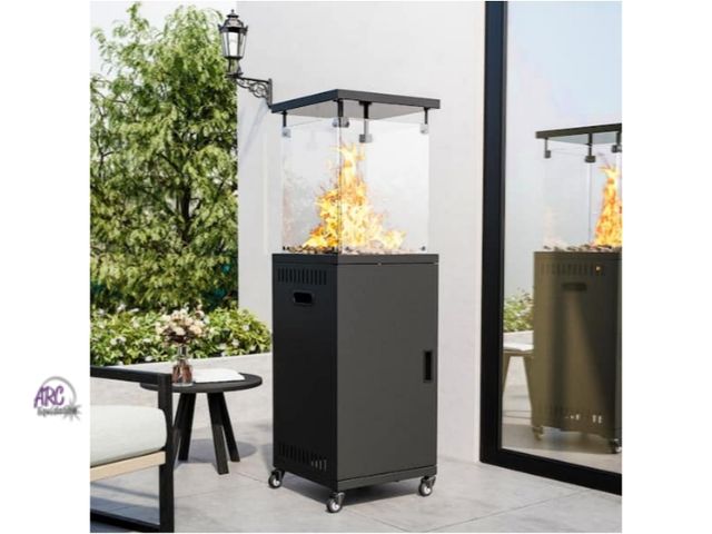 Lot 56-706443 - New in box. 50000-BTU Black Steel Floor Standing Propane Patio fire pit/Heater with Wheels. Glass wa...