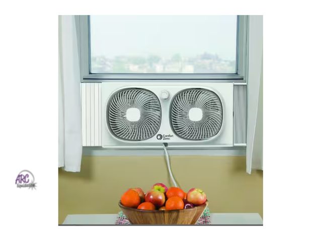 Lot 56-225861 - New In Box - Comfort Zone 9 in. Twin Window Fan with 3 Speeds and Dual Rotating Heads in White