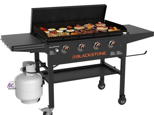 Lot 56-757598 - New in box nox. Blackstone 4-Burner 36" Griddle Cooking Station with Hard Cover. Missing acorn nuts ...