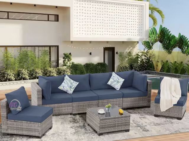 Lot 56-607660 - New and Assembled - GUKOO Gray 7-Piece Wicker Metal Frame Sofa Seating Group with Navy Blue Cushions...
