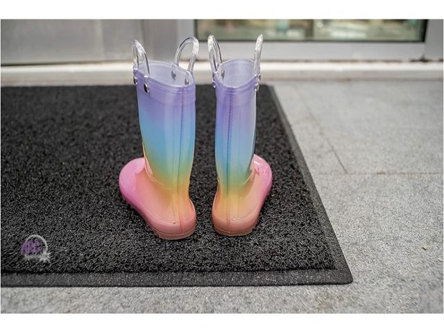 Lot 56-793640 - New Vinyl Loop Plain Doormat 2' x 6'. Has warehouse dust and debris from unrolling