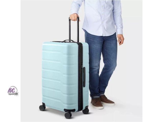 Lot 56-790123 - New Hardside Large Checked Spinner Suitcase - Open Story. 31.125" tall