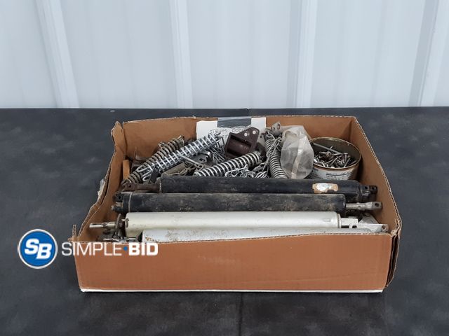 Lot 58-37140 - Box Full of Storm Door Parts and Hardware - Used