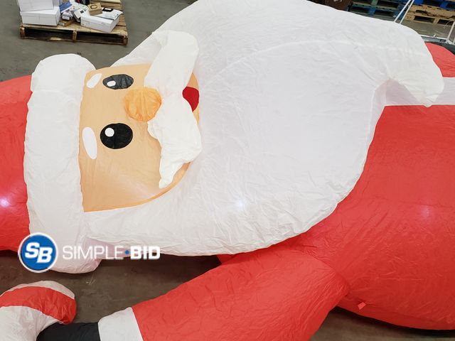 Lot 58-39582 - Inflatable SANTA -- approx. over 16ft tall - Takes awhile to inflate  - otherwise unused - does not ...