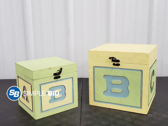 Lot 58-41293 - Lot of (2) Wooden ABC Blocks to store your items in - light use (1) approx. 7"x 7" (1) approx. 9" x ...