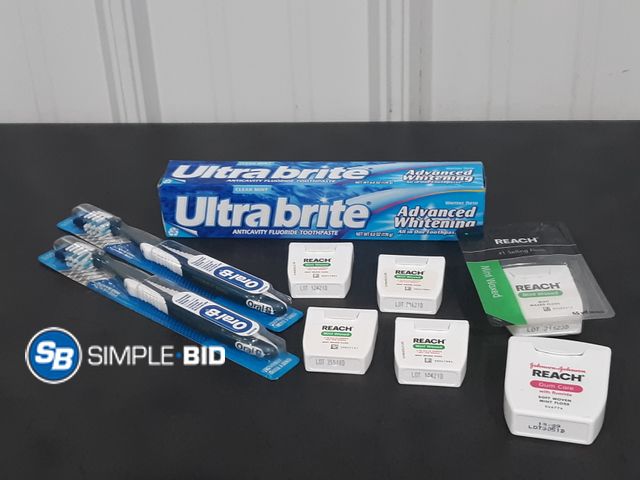 Lot 58-32645 - Tooth Care Package - Ultrabrite Toothpaste, (2) Oral B Toothbrushes, and (6) Reach Brand Floss