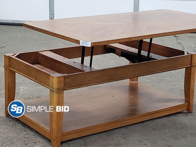 Lot 58-74697 - Decorative Wooden Coffee Table - Lifts up - approx. 4ft long on Wheels (great for moving) - in good ...