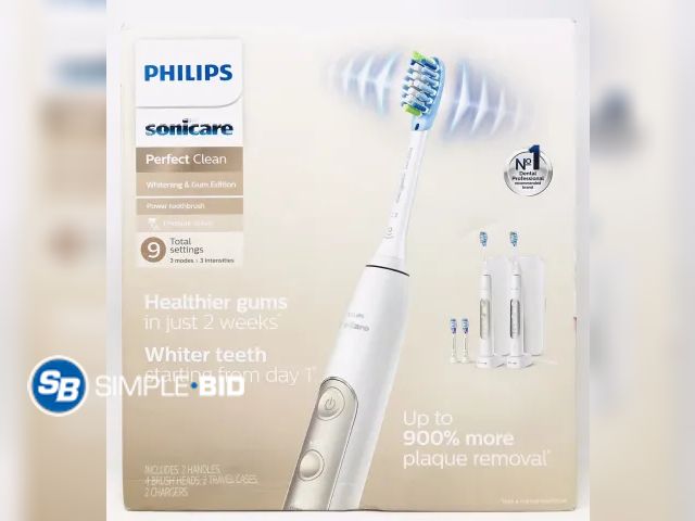 Lot 58-31631 - Philips Sonicare Perfect Clean Electric Toothbrush -- includes only 2 handles (1) Travel case (2) Ch...