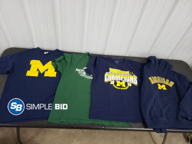 Lot 58-62732 - Lot of MENS shirts including MICHIGAN, MICHIGAN STATE- variety of sizes and styles - light use - in ...