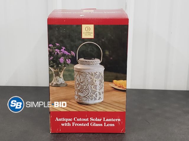 Lot 58-72411 - Compass Home Antique Cutout Solar Lantern with Frosted Glass Lens