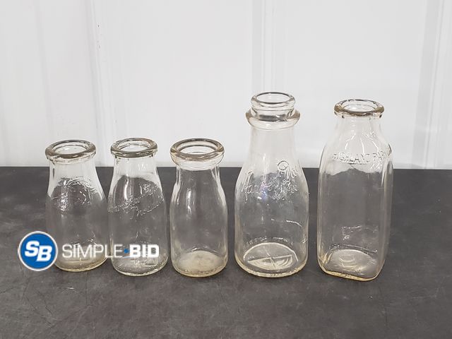 Lot 58-83509 - Lot of (5) Small Milk Jug Bottles
