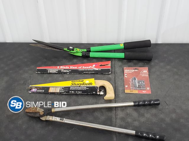 Lot 58-80970 - Lot of Misc. tools including Jigsaw blade set, 5 Blade nest saws, Stanley sharptooth, and much more