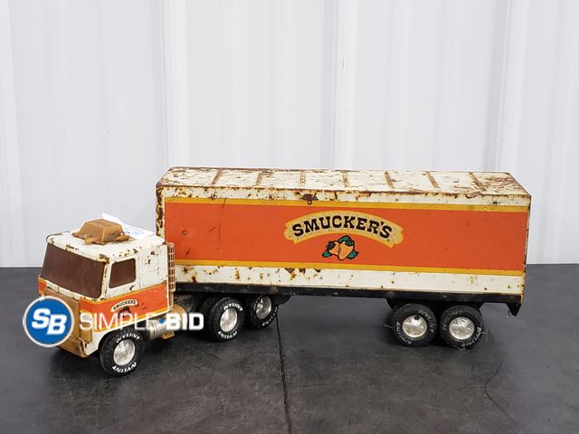 Lot 58-74734 - Rustic Metal Smuckers Semi Truck