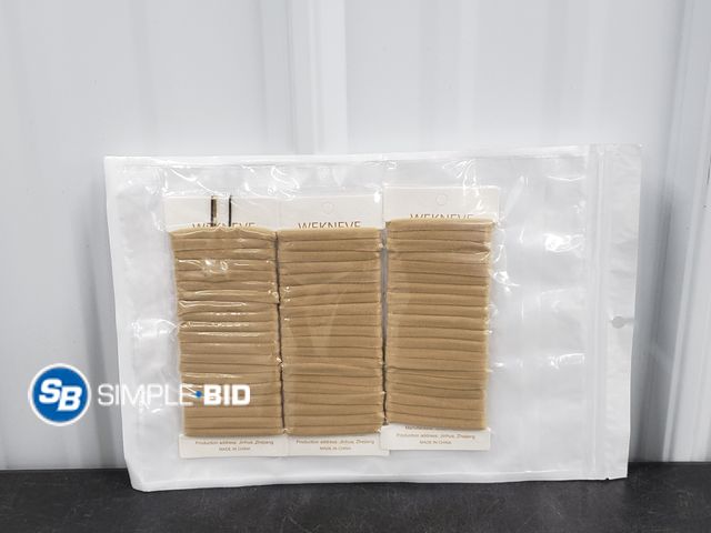 Lot 58-40443 - Lot of (60) Beige Hair Ties