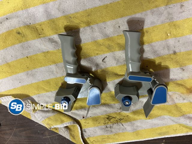 Lot 58-33938 - Lot of (2) New Hand held Tape Guns