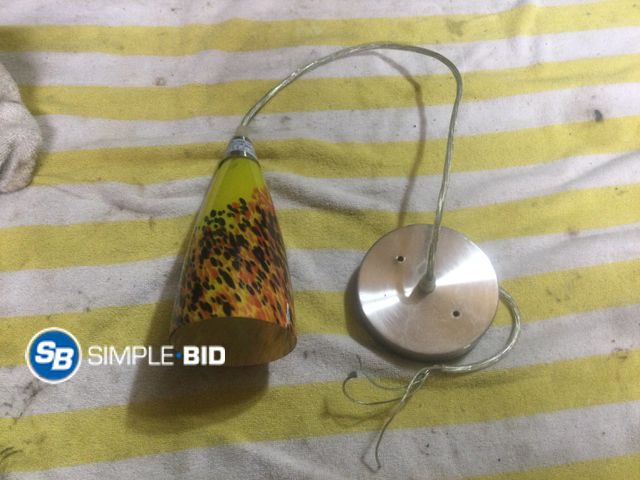 Lot 58-33973 - Yellow Glass Lamp with Black and Orange Design