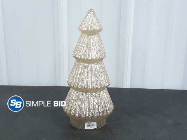 Lot 58-29609 - New Better Homes &amp; Gardens 12‘’ Decorative Tabletop Christmas Tree in Mercury Ribbed White Glass...